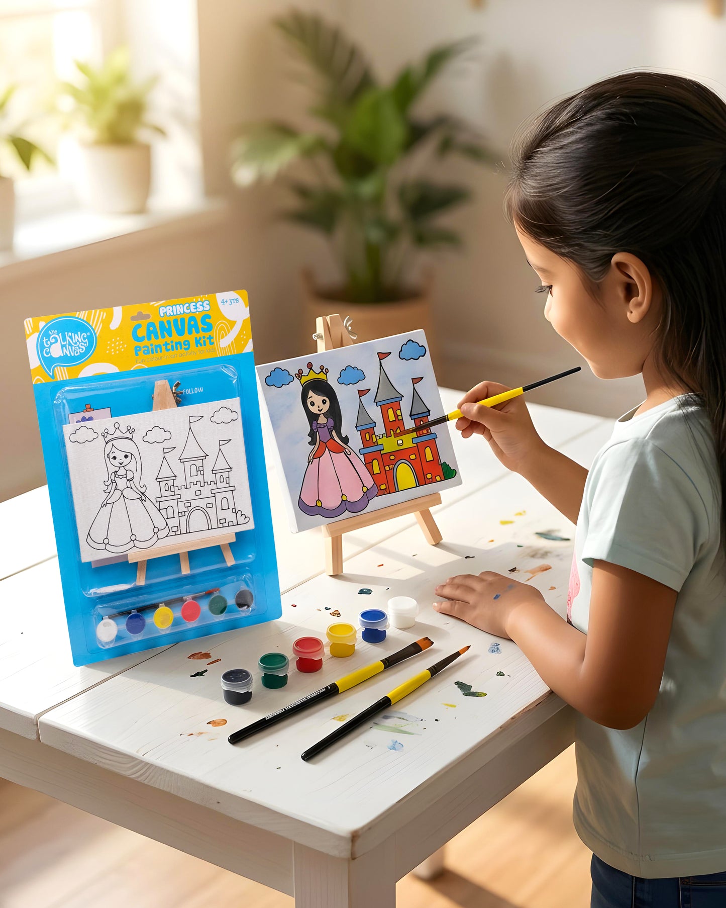 Child painting the Princess Canvas Painting Kit on a wooden easel using colourful acrylic paints during a fun screen-free creative activity.