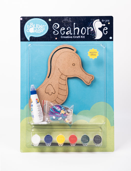 Creative Craft Kit – Seahorse front packaging with wooden seahorse craft, colourful paints, glue, yarn and sequins in blue packaging.