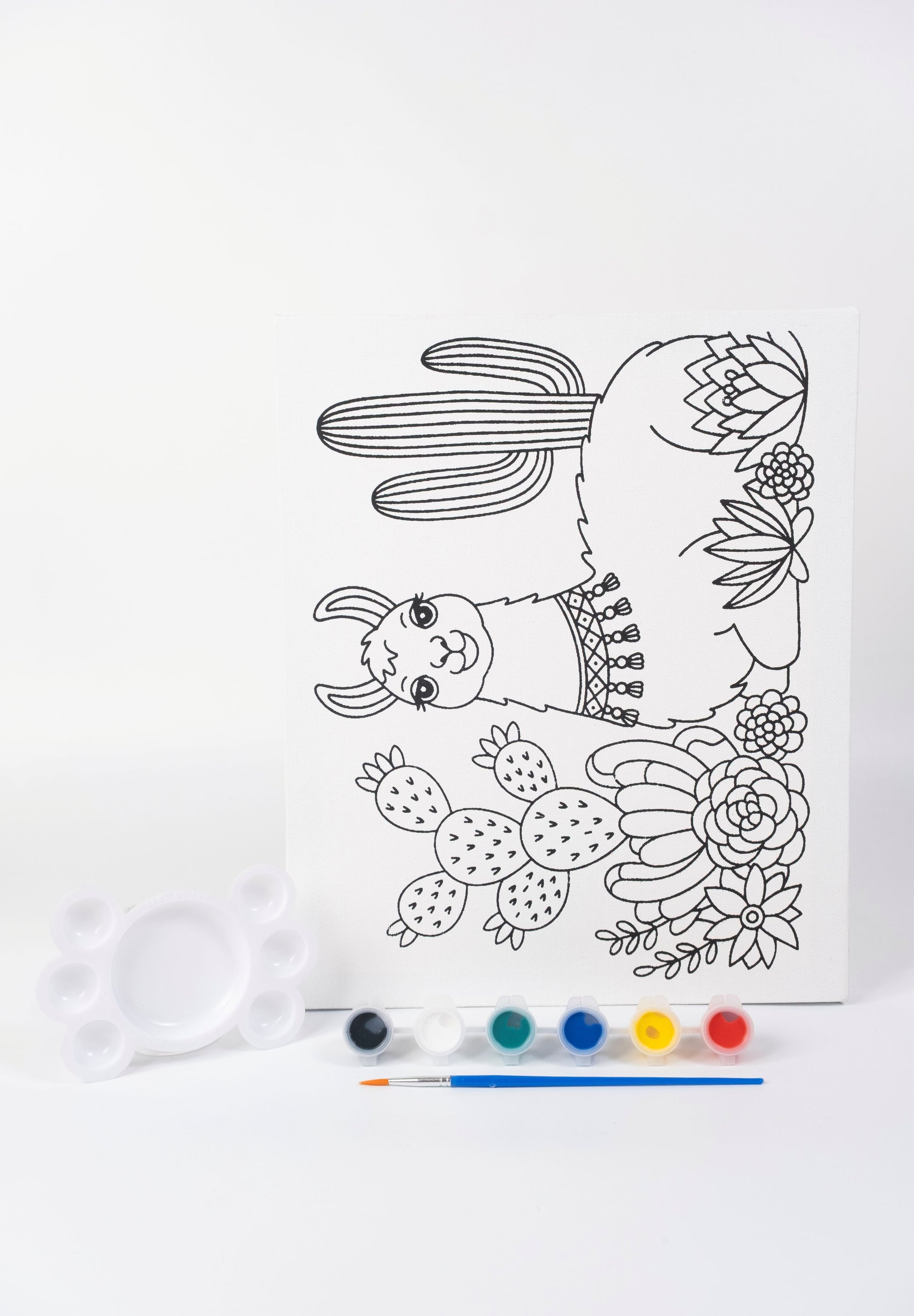 Llama Ready-to-Paint Canvas Kit for Kids 10×12 with canvas, six acrylic paints, blue brush and white palette.