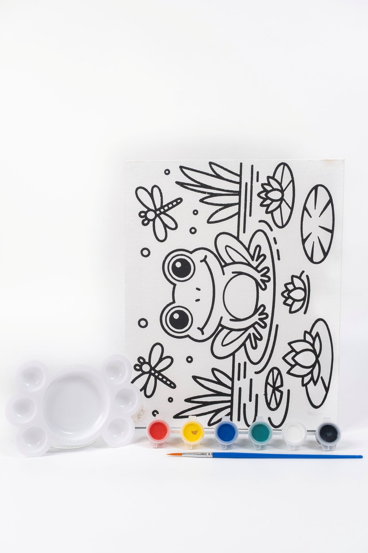 Frog Ready-to-Paint Canvas Kit 8×10 with pre-printed frog canvas, acrylic paint pots, paint brush and palette on a white background.
