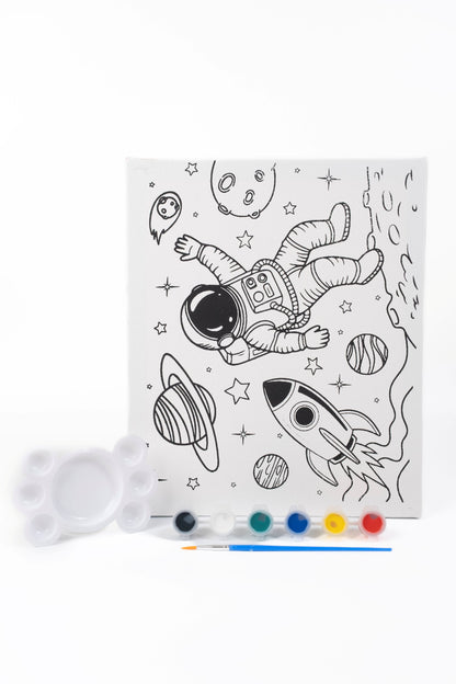 Astronaut Ready-to-Paint Canvas Kit with 10×12 pre-printed space-themed canvas, six acrylic paint pots, paint brush and paint palette.