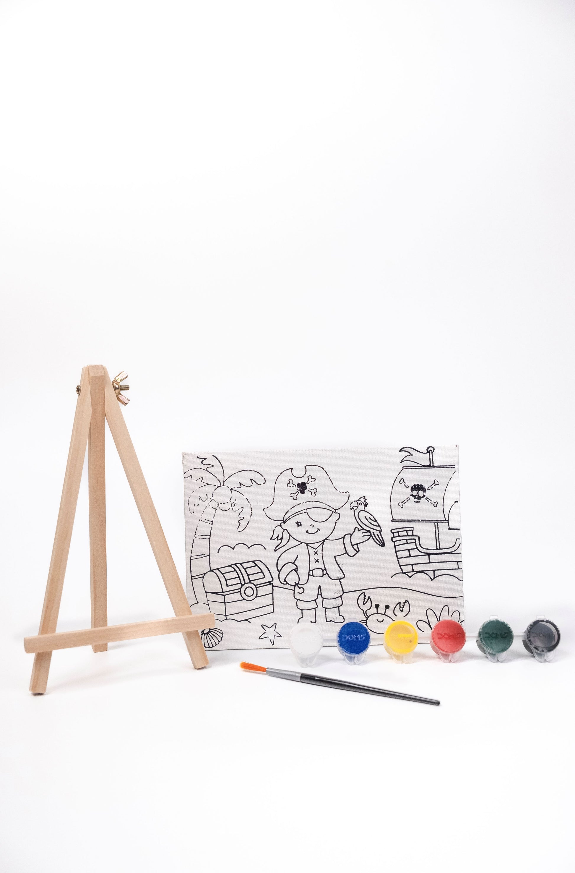 Pirate Canvas Painting Kit contents featuring a pre-printed pirate canvas, wooden easel, six acrylic paint pots and paint brush on a white background.