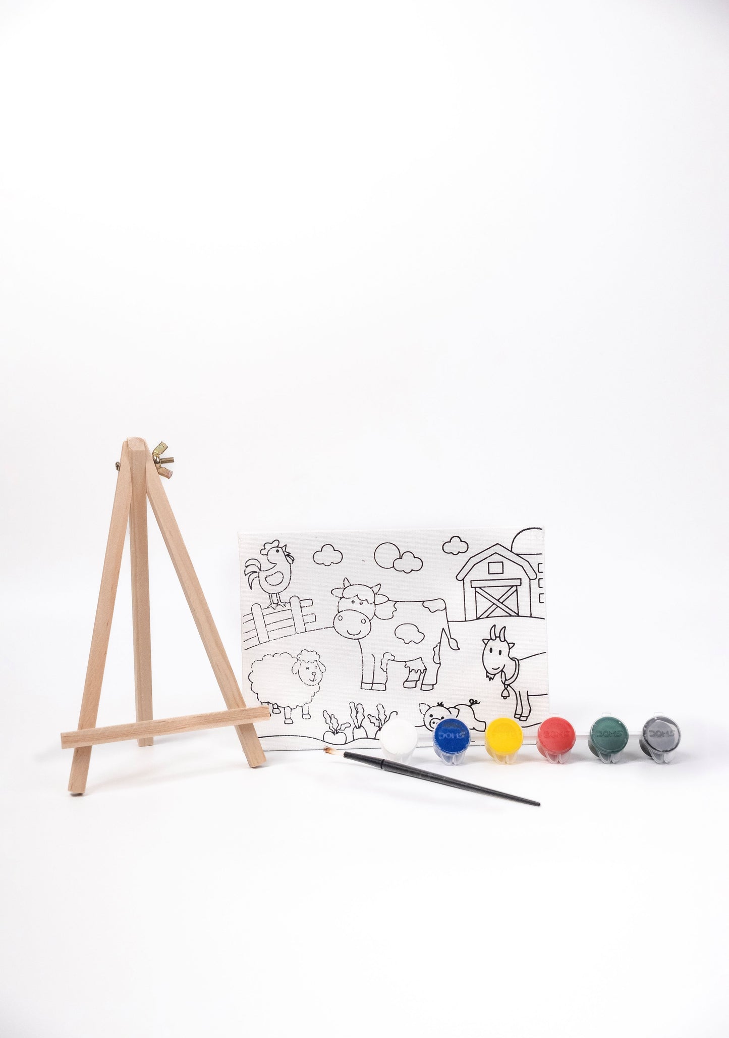 Contents of The Talking Canvas Farm Canvas Painting Kit including pre-printed farm canvas, wooden easel stand, paints and paint brush.