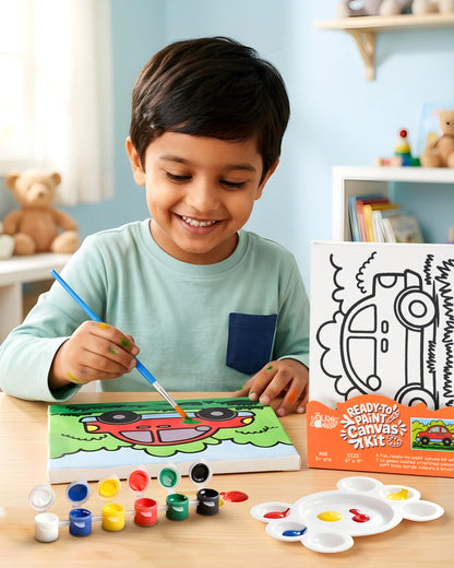 Child painting the Car Ready-to-Paint Canvas Kit 6×9 using acrylic paints to create a colourful car driving through a green countryside scene.